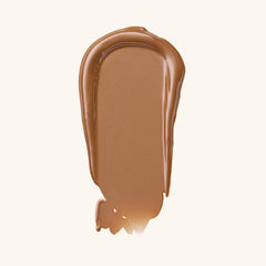 Catrice texture swipe showing creamy luminous fluid for buildable glow