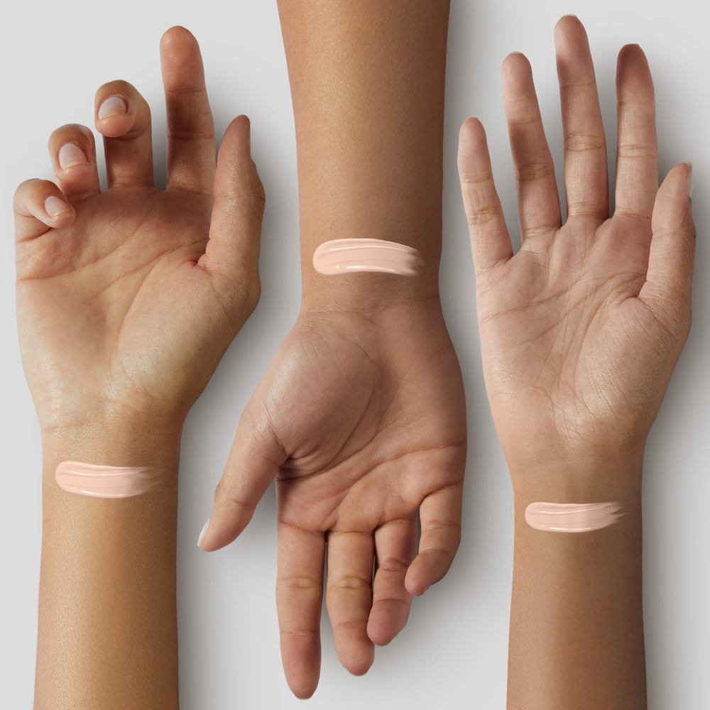 Arm swatches of Catrice True Skin showing Cool Cashmere shade matching benefit