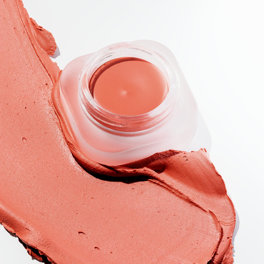 Catrice finger applying mousse blush demonstrating easy fingertip blending benefit