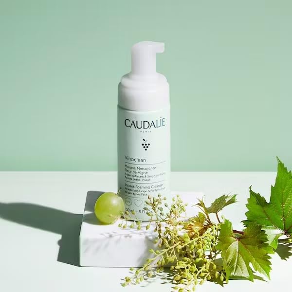 Caudalie 150 mL bottle beside a common item for size comparison convenience