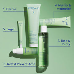 Caudalie Vinopure shown in hand for size comparison and travel convenience
