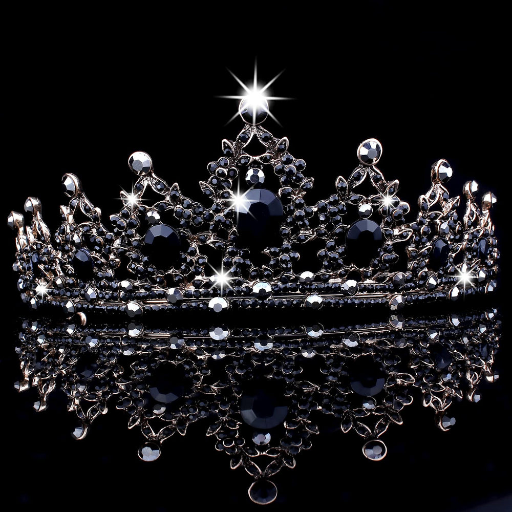 CAVETEE crown held by hand for scale showing compact wearable size
