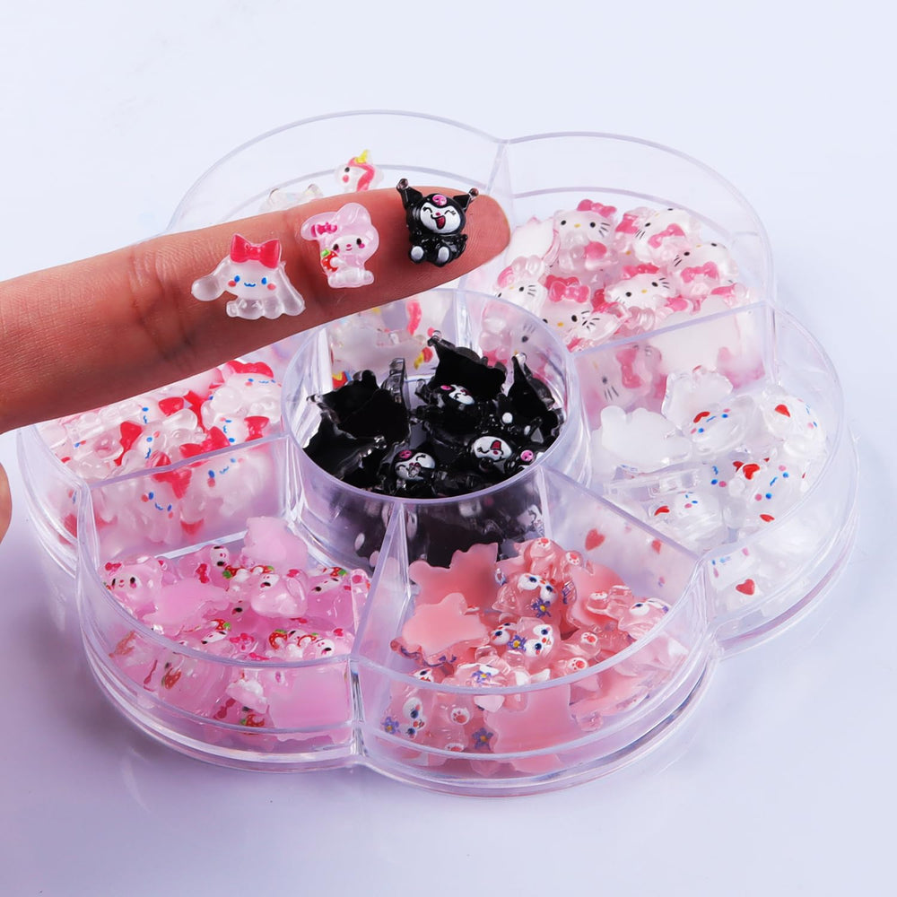 CDBOVID charms scattered on black surface showing color mix and easy selection benefit