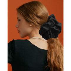 CEELGON scrunchie worn in a high ponytail showing volume and crease-free finish