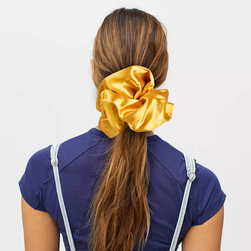 CEELGON scrunchie beside coin for size comparison showing jumbo 6.7-inch fit