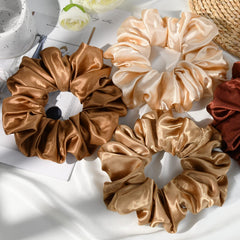 CEELGON scrunchie securing a thick ponytail shows dependable hold for voluminous hair