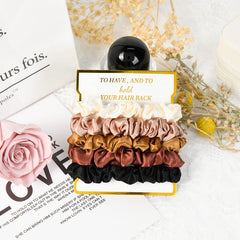 CEELGON scrunchie on gold foil card emphasizing keepsake-ready gifting
