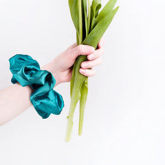 CEELGON scrunchie worn on wrist in lifestyle scene offering convenience and style