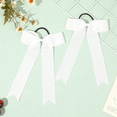 CEELGON bow held in hand to show true 5.5 by 9 inch size and lightweight feel