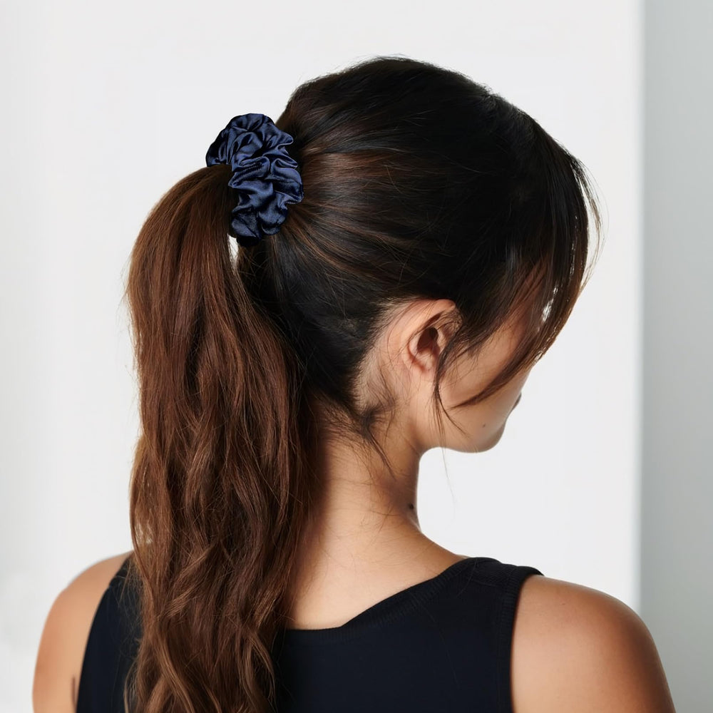 CEELGON bridesmaids wearing scrunchies during getting-ready photos for cohesive styling