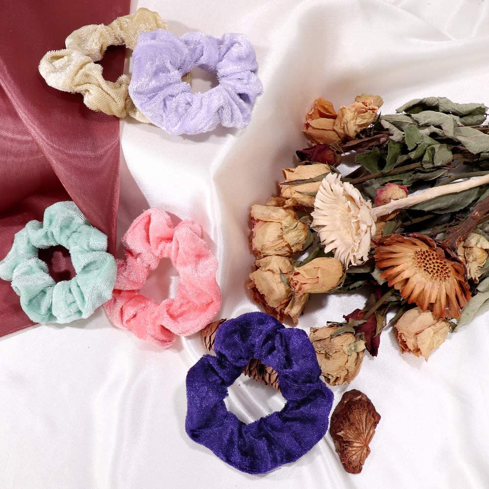 Cehomi scrunchie size compared in hand showing stretch and scale
