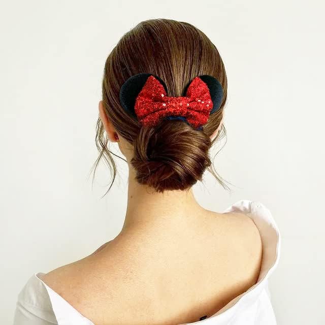 CellElection sequin bow detail showcasing sparkle that adds festive shine to hairstyles