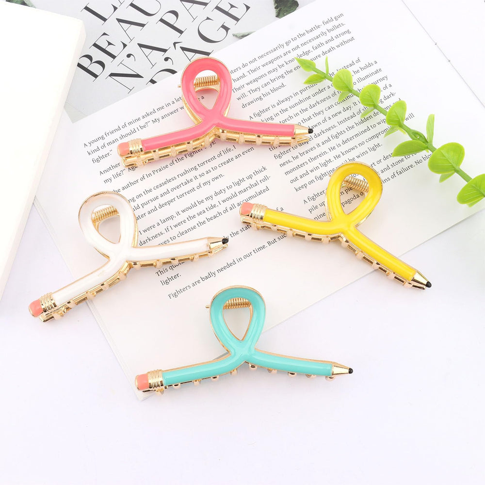 Chanaco clips on teacher desk with pencils, playful classroom-themed gift