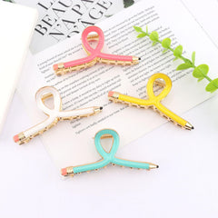 Chanaco clips on teacher desk with pencils, playful classroom-themed gift