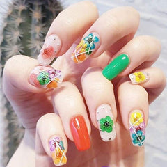 CHANGAR flower applied on nail showing delicate floral nail accent