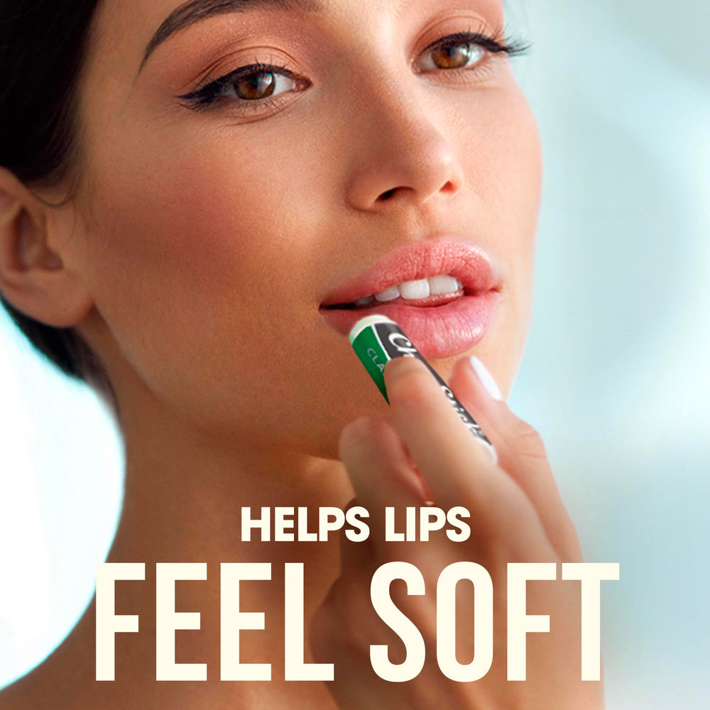 Open ChapStick tube being applied to lips demonstrating soothing moisture benefit