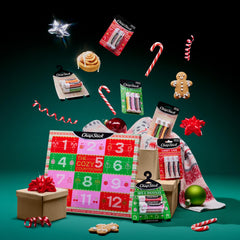 All twelve ChapStick tubes laid out flat to show flavor variety and gift-ready set