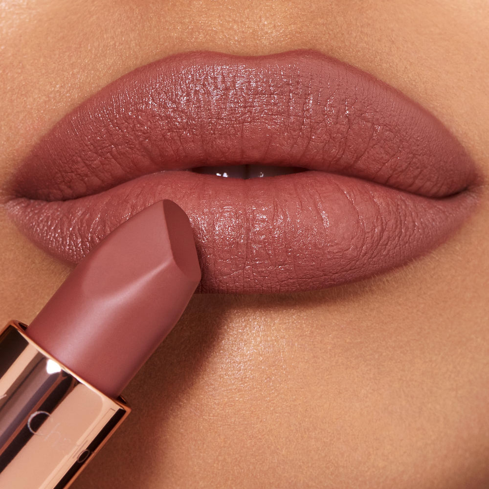Charlotte Tilbury lipstick applied on lips showing defined shape and comfortable finish
