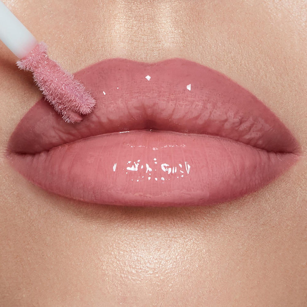 Charlotte Tilbury Collagen Lip Bath cap and label detail highlighting brand quality and gift-ready benefit