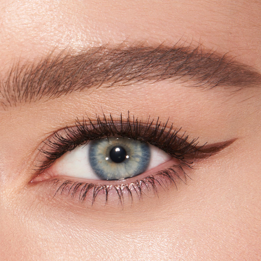 Charlotte Tilbury Super Brown swatch on skin displaying matte, rich pigment and true-to-shade payoff