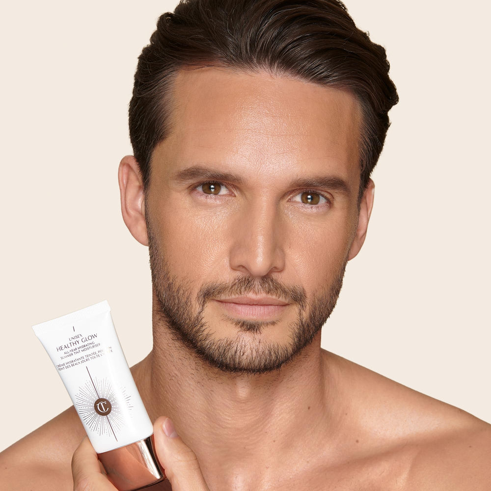 Charlotte Tilbury bottle on vanity lifestyle shot suggesting everyday radiance