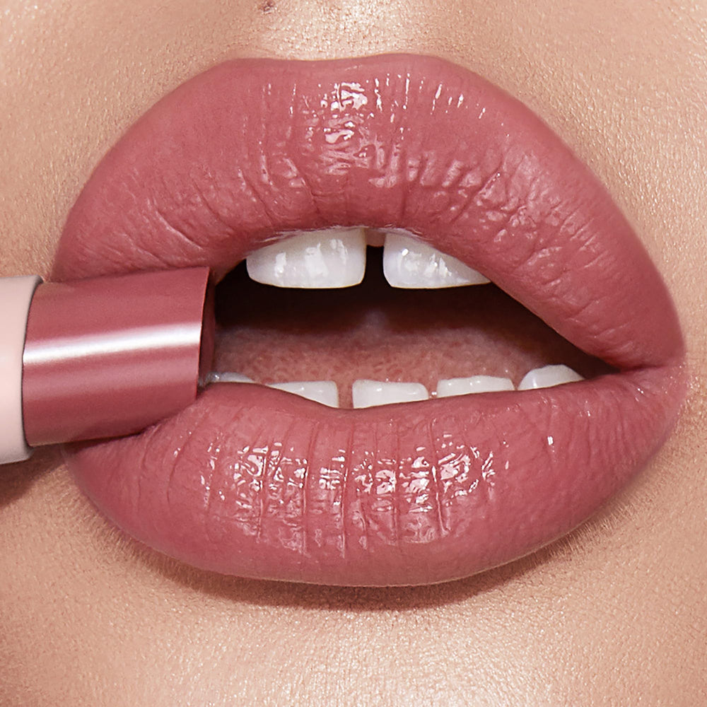 Charlotte Tilbury open twist mechanism revealing balm tip for controlled application