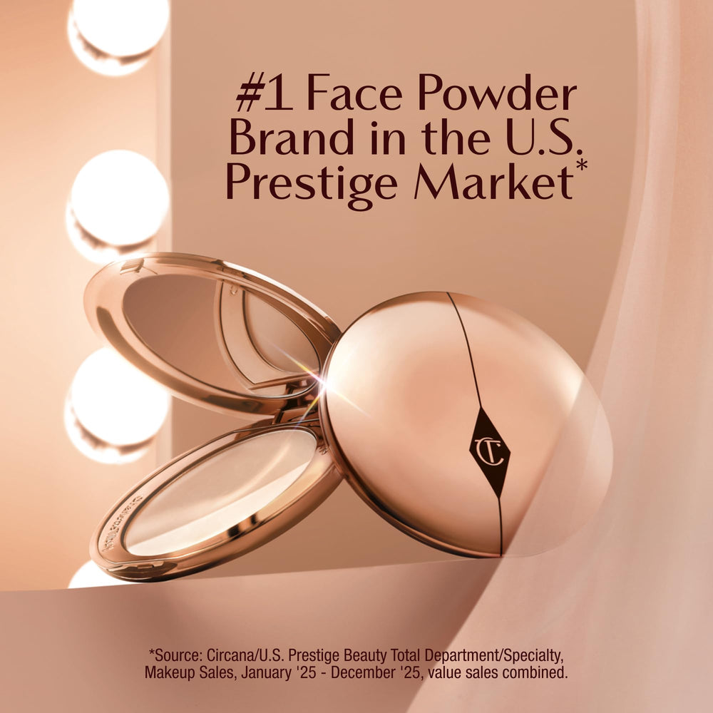 Charlotte Tilbury in use touchup on T‑zone for shine control benefit