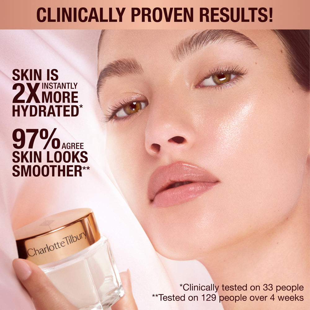 Charlotte Tilbury hand swatch applying cream demonstrating fast absorption and priming effect