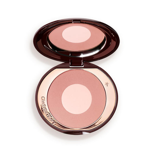 Charlotte Tilbury compact front view showing elegant packaging and immediate product appeal