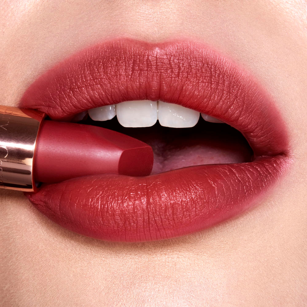 Charlotte Tilbury Walk Of No Shame applied on lips demonstrating flattering berry-rose finish