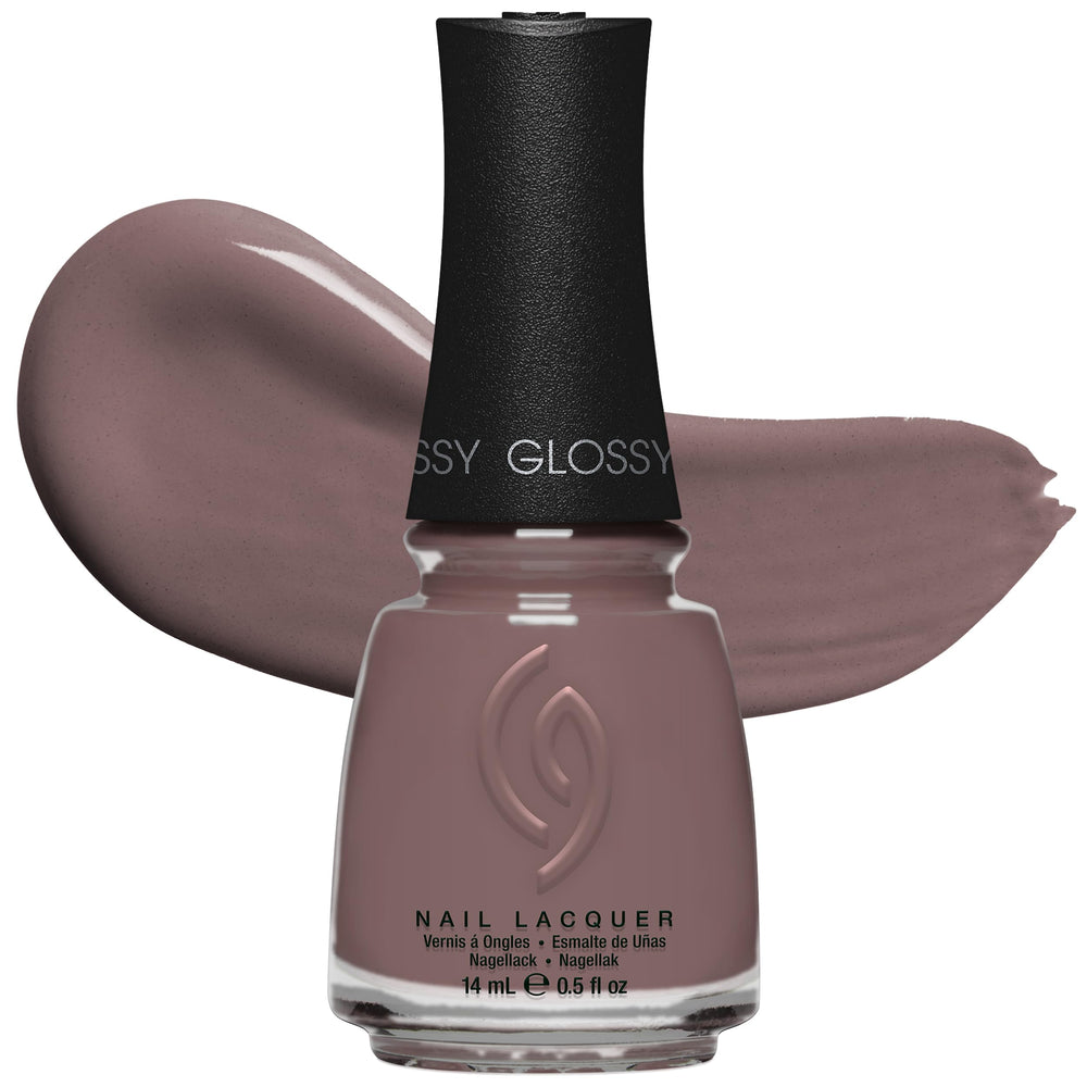 China Glaze manicure on hand in lifestyle setting showing wearable neutral shade
