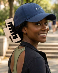 CHLINS demo showing clip arch over cap strap to preserve brim shape