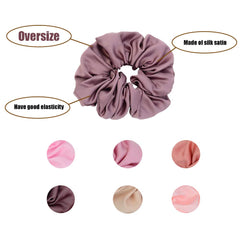 Chloven oversize scrunchie held in hand to show scale for secure hold