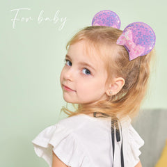 choicbaby toddler wearing a bow in lifestyle setting, adds playful princess look