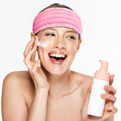 Chuangdi headband in use during makeup application keeping hair off face for cleaner results