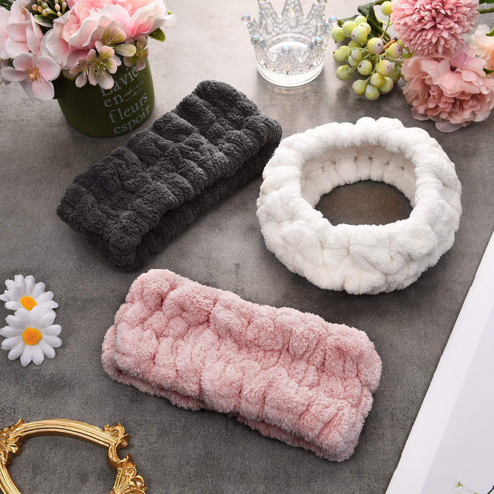 Chuangdi headband beside hand for scale to show comfortable width