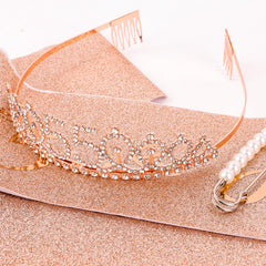 CIEHER crown and sash arranged on party table conveying festive styling