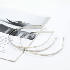 Cinaci stacked headbands showing silver gold and black color options for choice