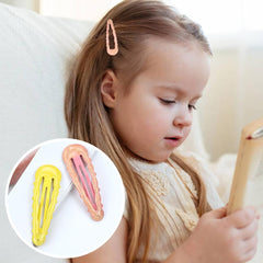 Cinaci clips next to ruler illustrating 5cm size for kids hair
