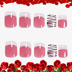 CJDLTS close-up of white French tip with black love line, sharp decorative detail