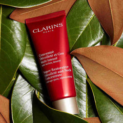 Clarins 75ml jar beside a ruler to show size and travel-friendly volume benefit
