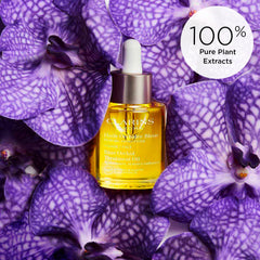 CLARINS hazelnut oil bottle image showing nourishing omega-9 and vitamin E benefit