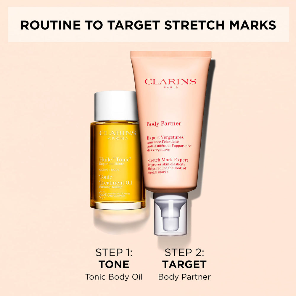 Clarins product beside ruler for scale to show tube size