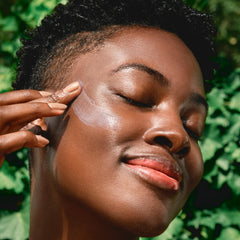 Clarins UV Plus texture close-up illustrating lightweight, oil-free finish