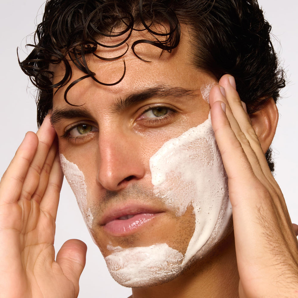 CLARINS men exfoliator cleanser foamy lather in hand, effective cleansing benefit