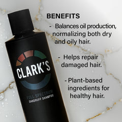 Clark's bottle in hand scale demonstrating compact 8 fl oz convenience