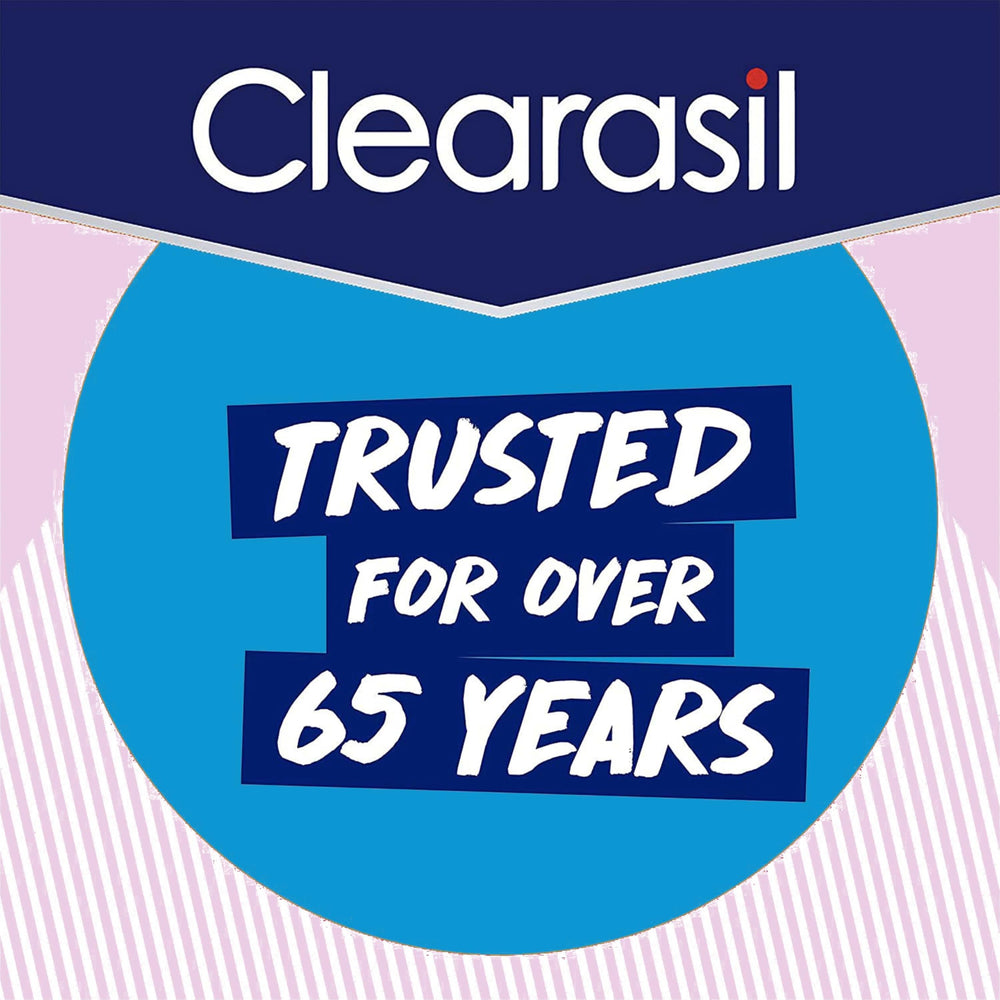 Clearasil patch beside fingers for scale, shows small size and targeted use