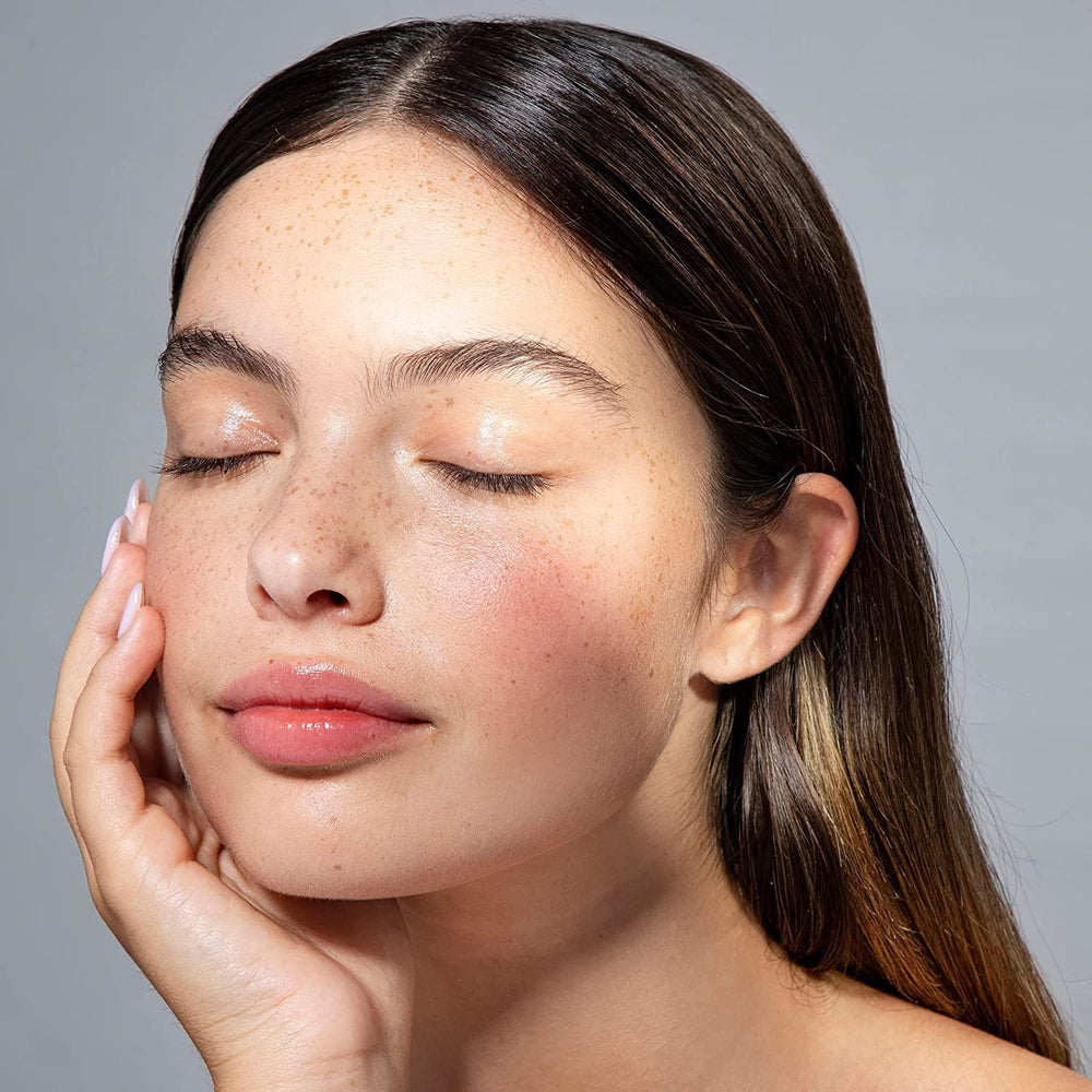Cliganic oil on hand demonstrating smooth texture and quick absorption