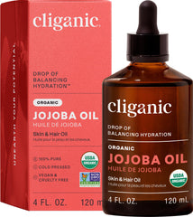 Cliganic jojoba oil front packaging showing bottle and benefits