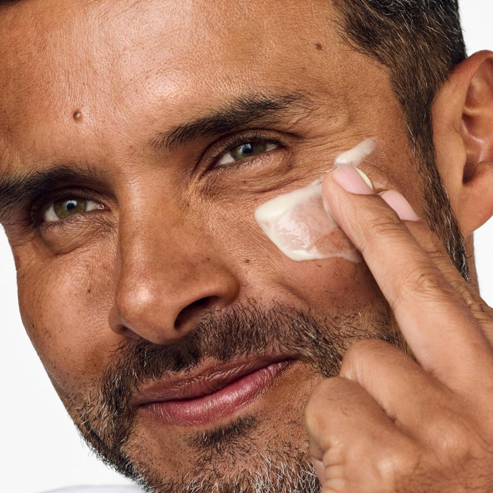 Clinique product applied on hands showing quick absorption and non-greasy finish